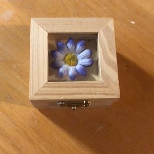 Little wooden box with flowers